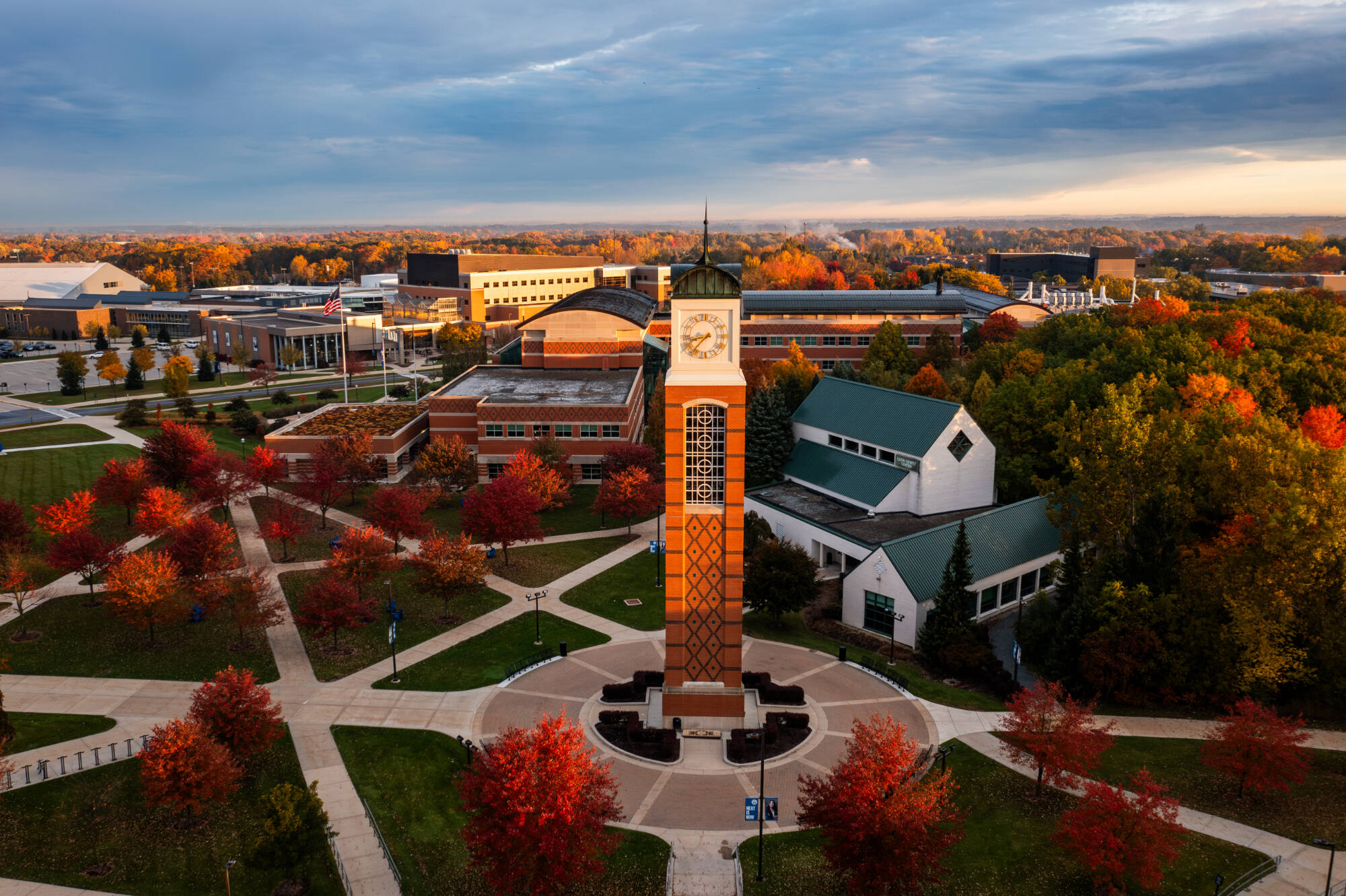 An image of the GVSU Allendale campus at sunset, featuring the Carillon Clock tower.
